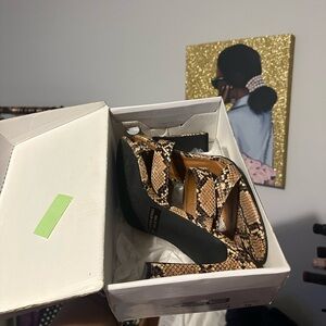 Gently worn snake sandals